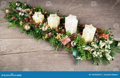 christmas garland with candles and pine cones on wooden background stock photo - image 399782