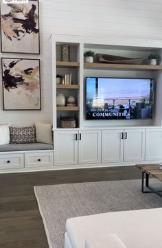 the entertainment center is clean and ready to be used as a living room or bedroom