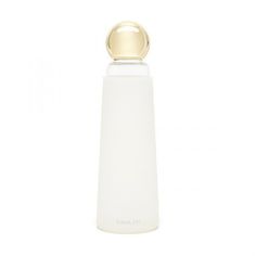 an empty white bottle with a gold lid