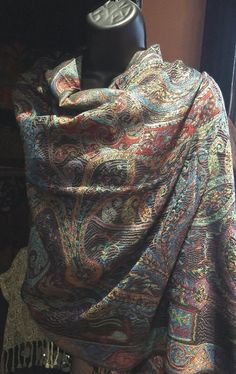 This is one of our favorites and certainly the most popular in a deep jewel tone on black, 28 X 70 inch This vintage-styled shawl features our paisley brocade design, styled from ancient Jamawar Kashmiri motifs Very soft and durable silk blend Free shipping in the US Our shawls arrive wrapped in tissue paper in a stylish peacock mailer.  Gift wrap is available. Thank you Etsy community for your support! We are grateful for thousands of great reviews!  PLEASE NOTE If we have multiples of the same Elegant Multicolor Shawl For Fall, Elegant Multicolor Fall Shawl, Traditional Paisley Print Shawl For Fall, Multicolor Vintage Shawl With Paisley Print, Vintage Multicolor Paisley Print Shawl, Burgundy Scarf, Paisley Shawl, Vintage Shawls, Orange Scarf