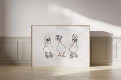 three ducks with hats on their heads are standing in front of a white wall and wooden floor