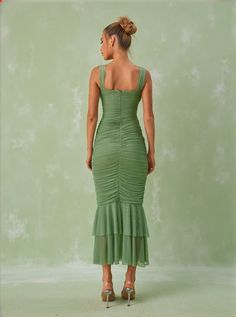 Eri Ruched Mesh Maxi Dress In Green The Eri Ruched Mesh Maxi Dress in a stunning green shade offers an elegant blend of sophistication and comfort. Its flowing maxi silhouette, adorned with delicate ruching and intricate mesh detailing, ensures you stand out at any event. Key Features Material: 100% Polyester for durability and easy care Closure Type: Invisible zipper opening at the back for a seamless look Fit: Designed to fit true to size with a non-stretch fabric ensuring your shape is perfec Green Ruched Dress With Fitted Bodice, Green Ruched Midi Dress With Fitted Bodice, Green Midi Dress With Ruched Fitted Bodice, Green Floor-length Ruched Dress, Green Ruched Evening Maxi Dress, Green Midi Dress With Ruched Bodice For Evening, Green Ruched Bodice Midi Dress For Evening, Green Pleated Bodice Maxi Dress For Evening, Elegant Green Maxi Dress With Ruched Bodice