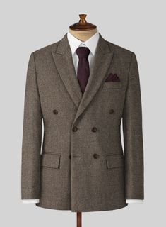 Sophisticated attire that doesn't sacrifice practicality in favor of elegance. Crafted from wool, our brown tweed suit is ideal for any occasion. Pair back your look with a white shirt and brown shoes to liven it up.     Look Includes  Dapper Brown Tweed Fabric  Double Breasted Jacket Style  Peak Lapel  Horn Brown Buttons  Single Vent  Three Cuff Buttons  Two welted back pockets on trousers    Click 'Customize Now' to modify the look if needed.   Lining: Viscose; Dry Clean. Double-breasted Brown Blazer With Welt Pockets, Brown Double-breasted Blazer For Business, Brown Double Breasted Suit With Lapel Collar For Office, Brown Tailored Double Breasted Suit With Lapel Collar, Formal Tweed Suit With Suit Collar, Brown Double-breasted Blazer For Semi-formal Occasions, Elegant Brown Double-breasted Suit, Brown Suits With Welt Pockets And Lapel Collar, Brown Double Breasted Suit With Lapel Collar