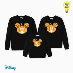 Get into the Halloween spirit with the Disney Mickey Mouse Sweatshirts featuring a glowing pumpkin design! Perfect for family matching outfits, these sweatshirts are great for Halloween festivities and fall savings. The spooky and fun pumpkin print with a glow-in-the-dark effect makes this casual top a must-have for the season. These cozy pullover tops are available in sizes for toddlers, kids, women (L-XL), and men (M-XL), making them perfect for couple and family matching outfits. These festiv Long Sleeves Tops, Glowing Pumpkin, Pumpkin Family, Mickey Mouse Sweatshirt, Mickey Mouse Halloween, Face Graphic, Stitch Clothes, Halloween Family, Fall Wardrobe Essentials