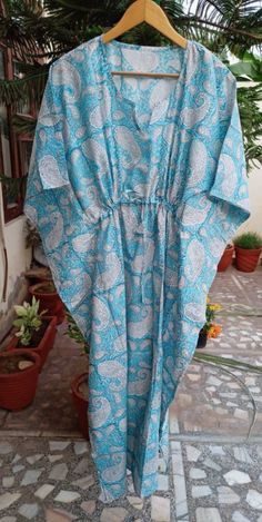 "These Kaftan we make from pure cotton Cambric Handblock print fabric. Handblock print gives it very unique look Size= Length 52\" Free size in chest . ." Traditional Cotton Kaftan For The Beach, Bohemian Blue Sleepwear For Vacation, Blue Bohemian Sleepwear For Vacation, Blue Cotton Kaftan In Free Size, Blue Cotton Kaftan For Loungewear, Blue Cotton Kaftan For Vacation, Blue Cotton Kaftan For The Beach, Blue Cotton Kaftan For Beachwear, Blue Free Size Cotton Kaftan