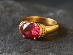 Gold Ruby Ring set with a Created Ruby in a perfect diamond cut, flawless clarity & deep red color, at 10x8mm, 3 Carats. Antique Ring design made of Gold Vermeil ☞ thickest 18k Gold Plating on top of Solid 925 Sterling Silver ☞ made to last. Matching Earrings & Matching Pendant - please ask me ☞ Choose your size ☞ I resize (before shipping) for FREE to Any size* ⌛Last Ring left ⌛ Details : ♥ Each item comes in a cute GIFT BOX ✓ ♥ GUARANTEE on the materials ✓ ♥ Created Ruby - perfect diamond cut Ruby Ring Designs, Man Gold Bracelet Design, Wide Gold Band, Ruby Ring Set, Antique Ruby Ring, Gold Ruby Ring, Red Gemstone Ring, Earrings Matching, Red Stone Ring