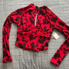 Free People Printed Long Sleeve Top Nwt Color: Black And Red Keyhole As Shown In Photos Button’s Located On Back Size: X-Small Could Fit Up To A Size 4 Edgy Red Top For Night Out, Red Stretch Edgy Top, Fitted Red Top In Edgy Style, Fitted Long Sleeve Tops For Date Night, Floral Print Long Sleeve Top For Night Out, Long Sleeve Floral Print Tops For Night Out, Red Floral Print Top For Night Out, Stretch Floral Print Tops For Night Out, Edgy Red Tops For Fall