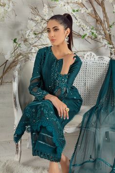 Stylish and trendy this mono tone silk net ensemble is a must have this Eid season, adorned with silk thread embroidery enhance with sequins, beads, pearls and stunning glitzy mirror details to accentuate the entire look, lace composed panels and bead tassel completes this look, paired with lace detailed culottes, mirror, pearl and lace embellished chiffon dupatta to uplift your day or night look. Shirt Fabric: Pure Silk Net Shirt Length: 45” cullotes Fabric: Khaadi Silk Dupatta Fabric: Pure Chi Designer Lace Sharara Semi-stitched, Eid Sequined Traditional Drape Sets, Festive Designer Sequin Palazzo Set, Festive Designer Palazzo Set With Sequins, Traditional Drape Sets With Sequins For Eid, Bollywood Style Sequined Palazzo Set For Eid, Party Wear Semi-stitched Sharara With Sequins, Festive Anarkali Palazzo Set With Sequins, Bollywood Style Chinon Palazzo Set With Sequins