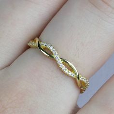 ✩ Made of solid sterling silver. Good for sensitive skin. ✩ Heavy gold plating gives the ring extra shine and durability ✩ Brilliant cut finest CZ stones, sparkle like real diamonds ✩ Ship beautifully packaged ✩ Shank width 3.5 mm ✩ Approx. weight: 1.8g More blings from Joylene: https://www.etsy.com/shop/joylenedesign We only choose the finest diamond simulants (CZ 5A) on the market, with a breathtaking level of brightness like real diamonds. Our jewelry can be found in stores and boutiques in I Rose Gold Infinity Ring, Gold Infinity Ring, Silver Infinity Ring, Clean Sterling Silver, Sterling Silver Stacking Rings, Infinity Ring, Full Eternity Ring, Silver Stacking Rings, Sterling Silver Engagement Rings