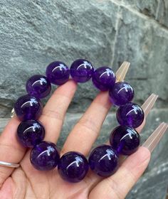 Material:Purple Amethyst Quartz beads size : Approx 19mm quantity: one strand  6mm approx 29 pcs one strands 7mm approx25 pcs one strands 8mm approx 22 pcs one strands 9mm approx 21pcs one strands 10mm approx 19 pcs one strands 11mm approx 18pcs one strands 12mm approx 16 pcs one strands 13mm approx 16 pcs one strands 14mm approx 15 pcs one strands 15mm approx 14pcs one strands 16mm approx 14 pcs one strands 17mm approx 13pcs one strands 18mm approx 13pcs one strands 19mm approx 12pcs one strand Purple Gemstone Beads Stretch Bracelet, Spiritual Purple Round Beads Stretch Bracelet, Purple Beaded Bracelet With Large Round Beads, Purple Spiritual Beaded Bangle Bracelet, Amethyst Gemstone Beads Bracelets As Gift, Purple Polished Beads Bracelets For Jewelry Making, Spiritual Purple Beaded Bangle Bracelets, Purple Polished Beads Bracelet For Jewelry Making, Purple Beaded Bracelets With Large Beads