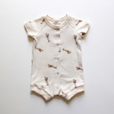 Hemlock Romper - Airplane – Violet and Hawthorn Casual Short Sleeve Bodysuit For Spring Playtime, Casual Cotton Short Sleeve Bodysuit, Casual Short Sleeve Bubble Romper For Playwear, Relaxed Fit Cotton Bodysuit For Loungewear, Organic Cotton Short Sleeve Onesie For Playwear, Organic Cotton Playwear Onesie, Cotton Short Sleeve Bodysuit For Playtime, Casual Cotton Bodysuit For Playtime, Casual White Short Sleeve Bodysuit For Play