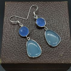 NOTE : WE USED NATURAL GEMSTONES , SO STONE MAY BE LITTLE DIFFERENT .Here is a listing of Aqua Quartz Sterling Silver Earrings About Product :- # Title - Silver Earrings # Material - Sterling Silver 925 # Stone - Blue calcy it will look very beautiful when you wear in party and special occasion .. It is A special gift for your loved once ... Note -Please see all images for more details . Thanks for visiting our shop. Favorite our shop for daily updates .. Light Blue Bohemian Dangle Jewelry, Handmade Chalcedony Jewelry Gift, Bohemian Light Blue Teardrop Earrings, Bohemian Handmade Light Blue Earrings, Blue Natural Stone Earrings As Gift, Elegant Chalcedony Earrings With Natural Stones, Elegant Chalcedony Drop Earrings, Light Blue Drop Earrings Jewelry Gift, Light Blue Drop Earrings For Gift