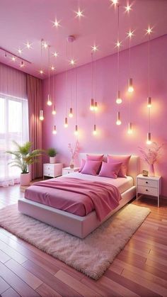 a bedroom with pink walls and lights hanging from the ceiling above the bed, along with a rug on the floor