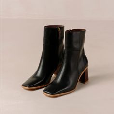 Incredible. They Still Have The Plastic On The Bottom. Never Worn. I Get Complimented On My Brown Versions All The Time. These Are Just A Touch Too Small As My Foot Has Grown Larger Than I Expected. This Is Definitely A True 10 1/2 As I Am 11 Right Now. Modern Black Heeled Boots With Contrasting Heel, Black Square Toe Heeled Boots With Reinforced Heel, Black Boots With Stacked Heel And Square Toe, Black Square-toe Boots With Stacked Heel, Black Square Toe Heeled Boots With Stacked Heel, Black Square Toe Boots With Stacked Heel, Black Square Toe Boots With Padded Heel, Classic Black Heeled Boots With Sculpted Heel, Black High Heel Boots With Contrasting Heel Counter