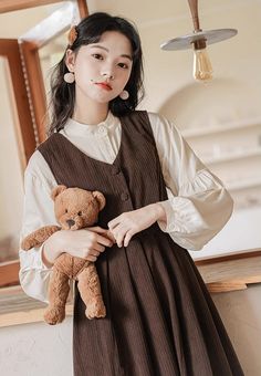 Basic corduroy pinafore dress in a midi length that can be layered with your favorite blouse or sweater. Buttons down the front and ties up at the waist. S: 33.5" chest and waist, 43" lengthM: 35" chest and waist, 43" lengthL: 36.5" chest and waist, 43.5" lengthXL: 38" chest and waist, 43.5" length Softgirl Outfits, Cute Shoes Boots, Corduroy Pinafore Dress, Softgirl Aesthetic, Muslim Outfits, Pinafore Dress, Shoe Gifts, Overall Dress, Sweater Blouse