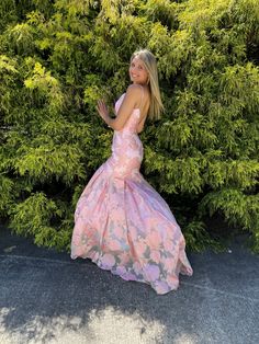 This exquisite floral organza jacquard gown provides a modernized look that will dazzle the onlookers. Featuring a form fitting mermaid silhouette with sweep train and a unique exposed back zipper detail, Rachel Allan 7087 Pink is sure to turn heads. Fitted Organza Gown For Homecoming, Fitted Floral Print Prom Gown, Fitted Floral Print Gown For Prom Season, Fitted Floral Print Gown For Prom, Fishtail Gown With Fitted Bodice For Homecoming, Prom Season Mermaid Silhouette Gown With Fitted Bodice, Mermaid Silhouette Gown For Prom Season, Spring Wedding Mermaid Dress With Fitted Bodice, Spring Prom Mermaid Dress With Mermaid Hem