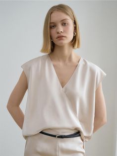 This is a trendy and feminine top by RENEJ that is made out of high quality and sturdy material. With distinctive mood of the design and comfortable wear, you can style it for your casual daily outfit.- Satin gloss of polyester fabric- V neckline and snap button- Unique and feminine mood Feminine Top, V Neckline, Daily Outfits, Snap Button, Polyester Fabric, Top Blouse, Satin, Top Outfits, Clothes For Women