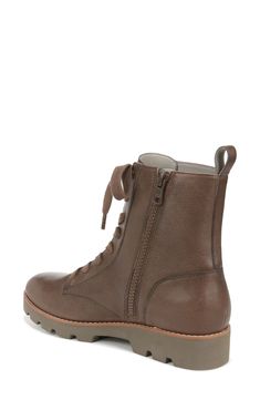 This classic combat boot with a cushioned EVA footbed and lightweight sole is a comfy go-to for grounding casual looks. 1 1/2" heel; 1" platform (size 8.5) 6" shaft Leather upper/textile lining/synthetic sole Imported Cushioned Ankle Work Boots For Fall, Fall Cushioned Ankle Work Boots, Casual Ankle Combat Boots For Walking, Casual High-top Combat Boots With Textured Sole, Casual Combat Boots With Reinforced Heel Medium Width, Casual Combat Boots High Ankle Medium Width, Casual Combat Boots With Textured Sole And Round Toe, Casual Combat Boots With Textured Sole For Fall, Casual Combat Boots With Textured Sole