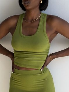 Green Seamless Tank Activewear, Green Moisture-wicking Athleisure Tank Top, Green Moisture-wicking Tank Activewear, Green Stretch Moisture-wicking Tank Top, Compressive Seamless Green Tank Top, Deodorant Stains, Racerback Top, Staple Pieces, Ribbed Fabric