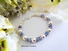 Elegant Blue Beaded Crystal Bracelet, Elegant Adjustable Blue Crystal Bracelet, Adjustable Light Blue Jewelry For Party, Light Blue Bracelet For Party, Blue Round Beads Bracelet For Wedding, Elegant Adjustable Blue Beaded Bracelets, Blue Round Bead Bracelets For Weddings, Adjustable Blue Crystal Bracelet For Anniversary, Light Blue Round Beads Jewelry For Wedding