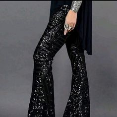 Black Hi-Waist Sequin Flare Leg Trousers Knitted Fabric 95% Polyester 5% Elastane Non-stretch Trousers For Night Out, Elegant Party Bottoms For Winter, Glamorous Full-length Winter Bottoms, Glamorous Full Length Winter Bottoms, Elegant Winter Party Bottoms, Black Stretch Glamorous Bottoms, Stretch Pants For Winter Party, Glamorous Stretch Black Bottoms, Glamorous Black Stretch Bottoms