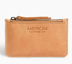 Organize credit cards, cash, and ID with this lined leather wallet featuring RFID protection and a secure zip closure. From American Leather Co. Classic Coin Purse With Zipper Pocket For Daily Use, Classic Coin Purse With Zipper Pocket, Classic Coin Purse With Zipper Closure For Everyday Use, Business Wallets With Zipper Pouch, Classic Brown Wallet With Zipper Pocket, Leather Coin Purse With Card Slots For Travel, Leather Rectangular Coin Purse With Zipper Pocket, Rectangular Leather Coin Purse With Zipper Pocket, Brown Leather Card Holder With Zipper