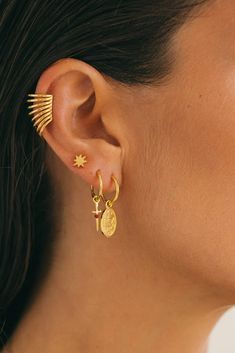 Eclectic love dagger stud earring in gold adds the perfect touch of edge to your ear stack collection. ✦ Hoop measures 12mm round / 14K GP Brass ✦ Pendant measures 13mm long / 14K GP Brass *This earring is sold as a single item Handmade in Bali, Indonesia Everyday Earring Stack, Edgy Gold Earrings, Gold Stacked Earrings Aesthetic, Gold Earring Aesthetic, Alt Earring Stack, Edgy Gold Pierced Earrings, Celestial Earring Stack, Gold Earring Stack, Gold Earrings Aesthetic