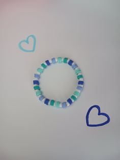 Hi! My name is Julia, I'm 12 and I decided to start a bracelet business to make some money and so I have something to do over the summer! I hope you love all the things in my shop there all handmade by me.  Please do not stretch bracelets, it will cause them to be bigger and more loose! ⚠️(May even cause them to break️ Shipping depends on where you live but it won't take long to deliver! Hope you love my bracelet! Cute Turquoise Handmade Bracelets, Playful Handmade Beaded Bracelets, Handmade Round Beaded Playful Bracelets, Playful Handmade Blue Bracelets, Cute Handmade Blue Beaded Bracelets, Playful Handmade Blue Bracelet, Playful Blue Stretch Bracelet Gift, Playful Blue Stretch Bracelet For Gift, Playful Blue Stretch Bracelet As Gift