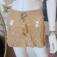 Short beige crochet skirt with drawstring - Beach/Pool Coverup skirt.  24" to 31" waist drawstring  12" length  Already made. Ready to ship. Summer Mini Skirt With Crochet Trim, Bohemian Lace Mini Skirt For Summer, Summer Beach Crochet Lace Skirt, Spring Beach Mini Skirt With Drawstring, Summer Beach Lace Mini Skirt, Crochet Mini Skirt For Summer, Casual Skirt With Crochet Trim For Vacation, Casual Lace Skirt For Beach, Beige Beachwear Skirt For Spring