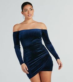 This glitter velvet mini dress is the perfect touch of sparkle for the party season! Featuring a figure-enhancing bodycon fit and off-the-shoulder design with fitted long sleeves, you'll make a glamorous statement while the side ruched seam and wrap mini-length hem add extra flair. Complete the look in platform heels for a holiday party!Fit & FeaturesOff-the-shoulder, fitted long sleevesBodycon fit, side ruched seamWrap mini-length hemGlitter velvet fabric, moderate stretchRuns true to size Glamorous Fitted Long Sleeve Off Shoulder Dress, Glamorous Long Sleeve Glitter Bodycon Dress, Glamorous Off-shoulder Bodycon Mini Dress, Off-shoulder Velvet Party Dress, Fitted Off-shoulder Velvet Dress, Glitter Long Sleeve Fitted Bodycon Dress, Fitted Long Sleeve Glitter Bodycon Dress, Blue Off Shoulder Mini Dress For Party, Off-shoulder Velvet Dress For Night Out