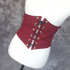 "This waist cincher is made in 100% Cotton in WINE RED.. The perfect compliment to your Witch, Pirate, Renaissance, Medieval or other fantasy cosplay costume. It is lined with cotton duck and it has spiral steel boning in the front for stability and to reinforce the grommets. A very comfortable, yet sturdy piece. Measure your waist as the smallest point (typically just about the belly button) and choose from the following sizes: X-SMALL: Waist 25.5 - 28 inches (64 - 71 cm) SMALL: Waist 28 - 31 i Tavern Wench, Pirate Oc, Medieval Tavern, Halloween Witch Costume, Steampunk Fantasy, Pirate Halloween, Goth Corset, Witch Halloween Costume, Steampunk Corset