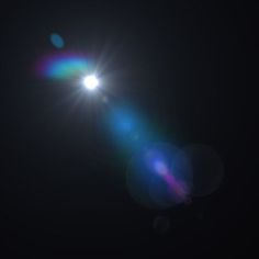 the sun shines brightly in the dark sky with lens flares on its side