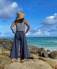 "Blue Stripe Cotton Palazzo Pants for Women Beautiful pants made with very soft cotton with stripe pattern, So so comfy and very flattering shape. Made with 100% soft double gauze cotton. Sizing: Made in one size to fit S to XL / US: 2/4/6/8/10/12/14/16 Measurement; Elastic waist 23 \"- 48\" Hip max 50\" Rise 11.5\" Length outseam 36\" Length inseam 24\" **Model is a size US 6. 5'4\" Tall. This pant will fit a range of Size (US) 4 to 16 Description: The fabric is super soft and has a beautiful l Navy Summer Wide Leg Pants, Navy Wide Leg Pants For Summer, Blue Cotton Beach Pants, Blue Loose Fit Trousers, Navy High-waisted Summer Pants, Summer Navy High-waisted Pants, Navy Wide-leg Pants With Elastic Waistband, Blue Straight Leg Harem Pants For Summer, Navy Straight Leg Bottoms For Summer