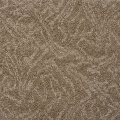 an upholstered fabric textured with brown and white designs on the outside of it