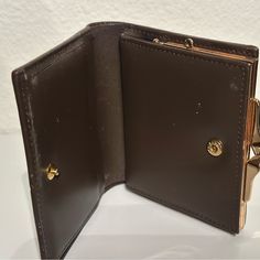 Authentic Burberry, Wallet, Great Condition Pre-Loved Used Once Business Bifold Wallet With Gold-tone Hardware, Bifold Business Wallet With Gold-tone Hardware, Luxury Brown Compact Coin Purse, Luxury Brown Coin Purse With Coin Pocket, Formal Bifold Clutch With Coin Pocket, Chic Leather Coin Purse With Card Slots, Evening Bifold Wallets With Gold-tone Hardware, Elegant Bifold Wallet With Gold-tone Hardware, Elegant Evening Trifold Wallet With Coin Pocket