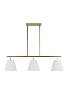 three light brass island fixture with white shades