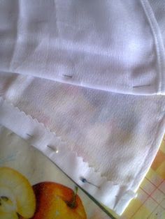 two pieces of cloth with apples on them