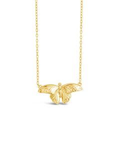 Indulge in the beauty and grace of our Rowena Butterfly Pendant Necklace. This exquisite piece boasts a delicate butterfly charm, suspended on a sleek pendant necklace. Let this elegant accessory be a symbol of your own transformation and free spirit. Elevate any outfit with this luxurious addition to your jewelry collection. Material: 14K gold or rhodium plated brass Features: Measures 16" with 2" extender, 1" pendant, 1.5mm chain, Lead & Nickel free, lobster clasp Elegant Butterfly Charm Pendant Necklace, Pendant Necklace With Butterfly Clasp For Gift, Elegant Butterfly Pendant Necklace With Butterfly Clasp, Delicate Butterfly Shaped Jewelry With Adjustable Chain, Elegant Pendant Necklace With Butterfly Charm, Elegant Butterfly Shaped Jewelry With Adjustable Chain, Elegant Butterfly Necklace With Adjustable Chain, Elegant Gold Butterfly Charm Necklace, Elegant Butterfly Charm Necklace With Adjustable Chain