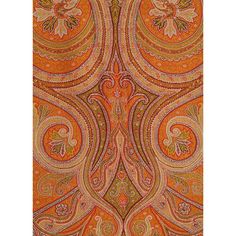 an orange and brown rug with paisley designs on the bottom, along with other patterns