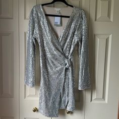 Nwt Long Sleeve Wrap Sequin Dress From H&M. H&m V-neck Party Dress, H&m Dress For Date Night In Spring, H&m Spring Dress For Date Night, Elegant Sequined H&m Dresses, Elegant H&m Dresses With Sequins, Elegant H&m Sequined Dresses, H&m Sequin Dresses For Spring, H&m Dresses For Party Season, H&m V-neck Dress For Formal Occasions