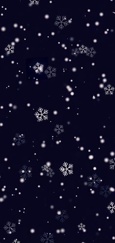 snow flakes are falling down in the night sky