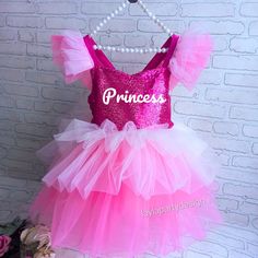 Hair Accessory is a Gift 🎁| Free and Fast Shipping ✈️ | Quality Hand Workmanship 💪🏻 Handmade Dress Up Costumes Take your birthday celebration to new heights of glamor and elegance with our perfectly luxurious Personalized Birthday Pink Sequin Dress. This stunning handmade dress is designed to make you feel like a princess when you're the center of attention on your special day. * The straps of our dress are not fixed, there is an adjustable elastic at the back. This gives you the advantage of Holiday Princess Tutu Dress For Dress-up, Princess Style Glitter Dress For Dress-up, Pink Princess Tutu Dress For Holiday, Holiday Princess Pink Tutu Dress, Pink Tulle Tutu Dress For Christmas, Christmas Princess Dress In Pink, Pink Princess Dress For Christmas Party, Pink Ruffled Tutu Dress For Christmas, Princess Dress For Party Season Dress-up