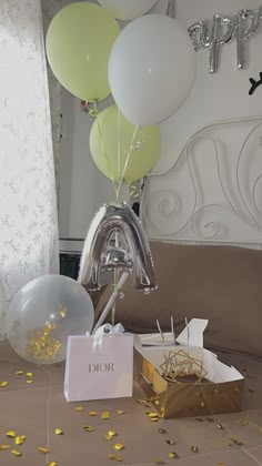 balloons and confetti are on the bed