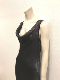 The perfect little black slip dress. Made by Espirit De Corp in the 80's. Classic style with cowl neck. Label states: 100% Acetate (soft & silky fabric) Size 13/14. Please lay flat dimensions a bit smaller. Condition: Excellent-pre-owned. Please see pictures. The perfect cocktail dress. Lay flat measurements:  Shoulder to shoulder: 15 inches. Armpit to armpit: 18 inches. Waist: 17 inches. Hips: 19 inches. Length: 40 inches. Fits like a small-medium. Mahalo, Christina Fitted Slip Dress With Cowl Back For Date Night, Chic Slip Dress With Fitted Cut And Cowl Back, Fitted Cowl Back Slip Dress For Night Out, Chic Fitted Slip Dress With Cowl Back, Bias Cut Draped Slip Dress For Night Out, Sleek Cowl Neck Slip Dress For Parties, Party Slip Dress With Cowl Neck And Bias Cut, Fitted Bias Cut Slip Dress, Chic Fitted Slip Dress With Cowl Neck