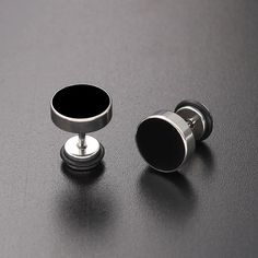 Unleash your inner style maverick with our Men's Stainless Steel Stud Earrings in sleek black. Crafted for the modern trendsetter, these earrings blend contemporary edge with timeless sophistication. Forged from high-quality stainless steel, these studs exude durability and resilience, ensuring they stand the test of time. The sleek black finish adds a touch of understated elegance, making them versatile enough to complement any ensemble, whether casual or formal. With a minimalist design, these earrings offer a subtle yet impactful accent to your look, effortlessly elevating your style game. Lightweight and comfortable to wear, they are perfect for everyday wear or special occasions, adding a dash of confidence and charisma to your persona      Earrings Height: 10mm Width: 10mm     Materi Modern Internally Threaded Adjustable Earrings, Minimalist Black Stainless Steel Earrings, Black Nickel-free Stainless Steel Earrings, Nickel-free Black Metal Plug Earrings, Modern Internally Threaded Metal Plug Earrings, Adjustable Matte Black Modern Jewelry, Modern Matte Black Adjustable Jewelry, Black Surgical Steel Earrings For Gift, Modern Black Hypoallergenic Jewelry