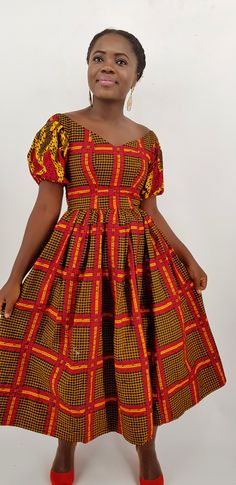 This beautifuldress is handmade with vibrant African print. The bodice is lined and it is fitted with zipper at the back. Buyers can request customization if measurement is different from standard. Dress length from the waist Midi- 31 inches (as pictured) Knee-25 inches Please allow 7 to 10 business days for production, standard shipping takes 10-20 business days to deliver. Color may be different due to your monitor Packing: in order to save your shipping cost, each dress will be packed tightly Red Fitted Ankara Dress, Yellow Fitted Ankara Fabric Dress, Fitted Multicolor Sweetheart Neckline Dress, Fitted Multicolor Ankara Fabric Dress, Fitted Multicolor Ankara Dresses, Fitted Multicolor Ankara Fabric Midi Dress, African Midi Dress, Black Wedding Guest, African Head Scarf