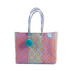 Meet your new favorite beach bag. This super flexible, water-resistant woven Super Tote is made using 100% recycled plastic to fit all your beach-day essentials with a spacious interior and comfortable handles for toting anywhere.  The Super Tote is the perfect size and style to carry everything you may need for a beach vacation including your towel, go-to book, sunnies, snacks, and as many sunscreens as you want.  Handmade with amor from ethically sourced high-quality materials, this bag will b Summer Beach Reusable Shoulder Bag, Recyclable Tote Beach Bag For Vacation, Summer Beach Bag, Recyclable, Reusable Blue Beach Bag, Summer Beach Bag Recyclable, Summer Reusable Bag For Vacation, Blue Recyclable Beach Bag For Summer, Eco-friendly Recyclable Shoulder Bag For Beach, Blue Handwoven Summer Beach Bag