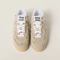 Miu Miu Denim Sneakers - Colonial Beige | Editorialist Miu Miu Jeans, Miu Miu Sneakers, Miu Miu Denim, Fraying Fabric, Designer Sneakers Women, Miu Miu Logo, Beige Sneakers, Round Toe Sneakers, Denim Sneakers