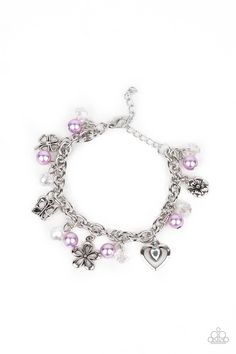 Infused with purple pearls and iridescent crystal-like beads, mismatched silver charms including a clover, butterfly, heart, and floral frames swing from a chunky silver chain around the wrist. Features an adjustable clasp closure. Sold as one individual bracelet. Floral Frames, Butterfly Heart, Indie Jewelry, Jewelry Watch, Turquoise Bead Bracelet, Purple Bracelet, Iridescent Crystal, Purple Pearl, Pearl Cluster