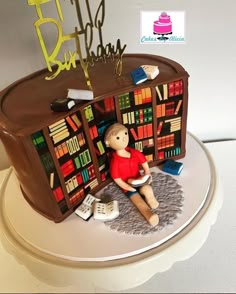 a cake that is shaped like a bookcase